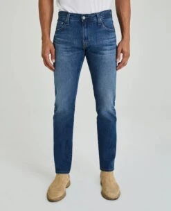Dylan Slim 17 Years Radar Mid-Light Blue Denim - AG Jeans